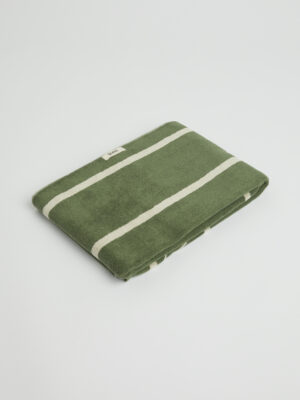 Green towel with white stripes by Tawul Living
