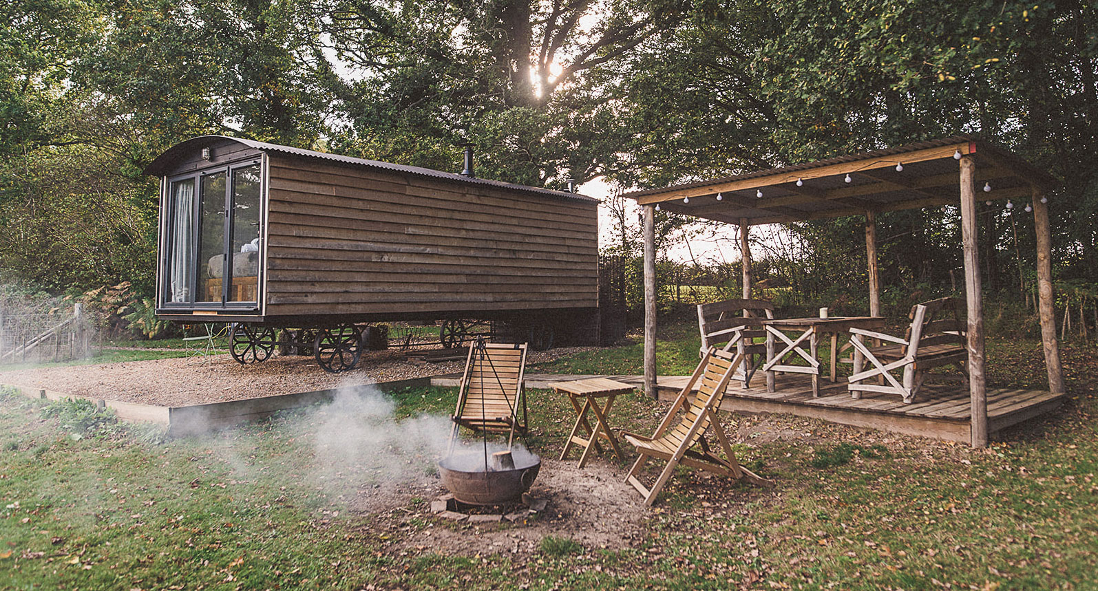 Cabin and outdoor seating area with fire pit